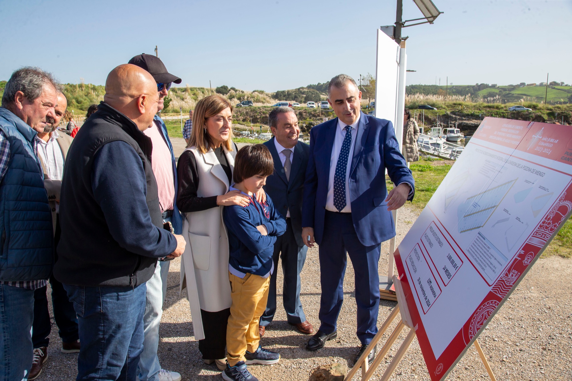 Cantabria government representatives and local port representatives review the La Pozona harbour plan beside the autonomous small-craft port basin
