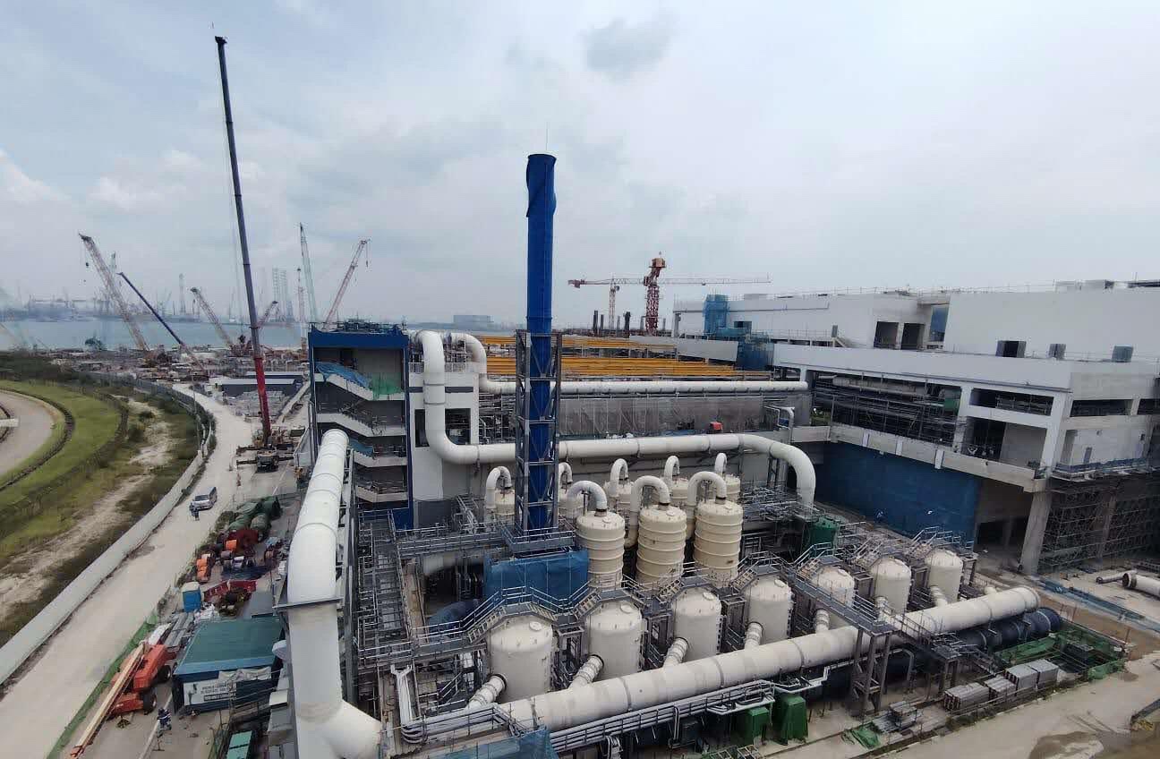 Aerial view of the Domestic Liquid Module odour-control facility, process vessels and pipework under construction at Tuas Water Reclamation Plant