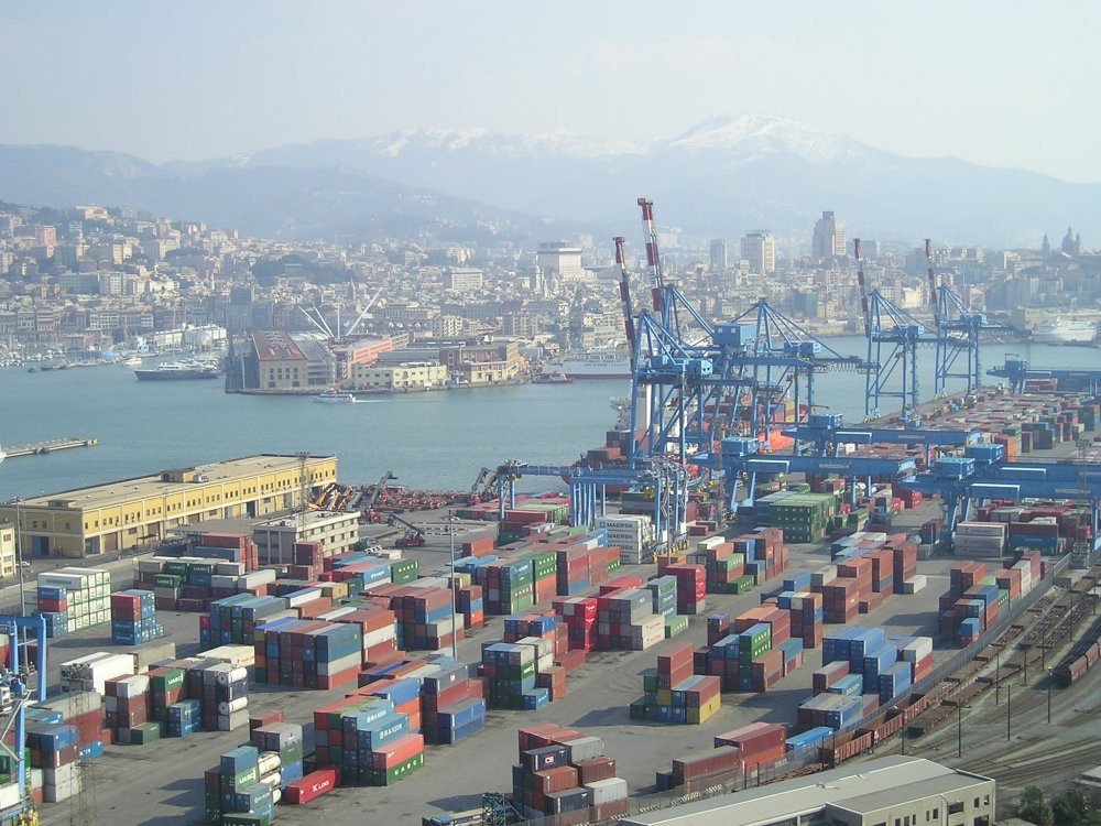 March 2005 view of Genoa's commercial container terminal, rail sidings, harbour, and city from the Lanterna