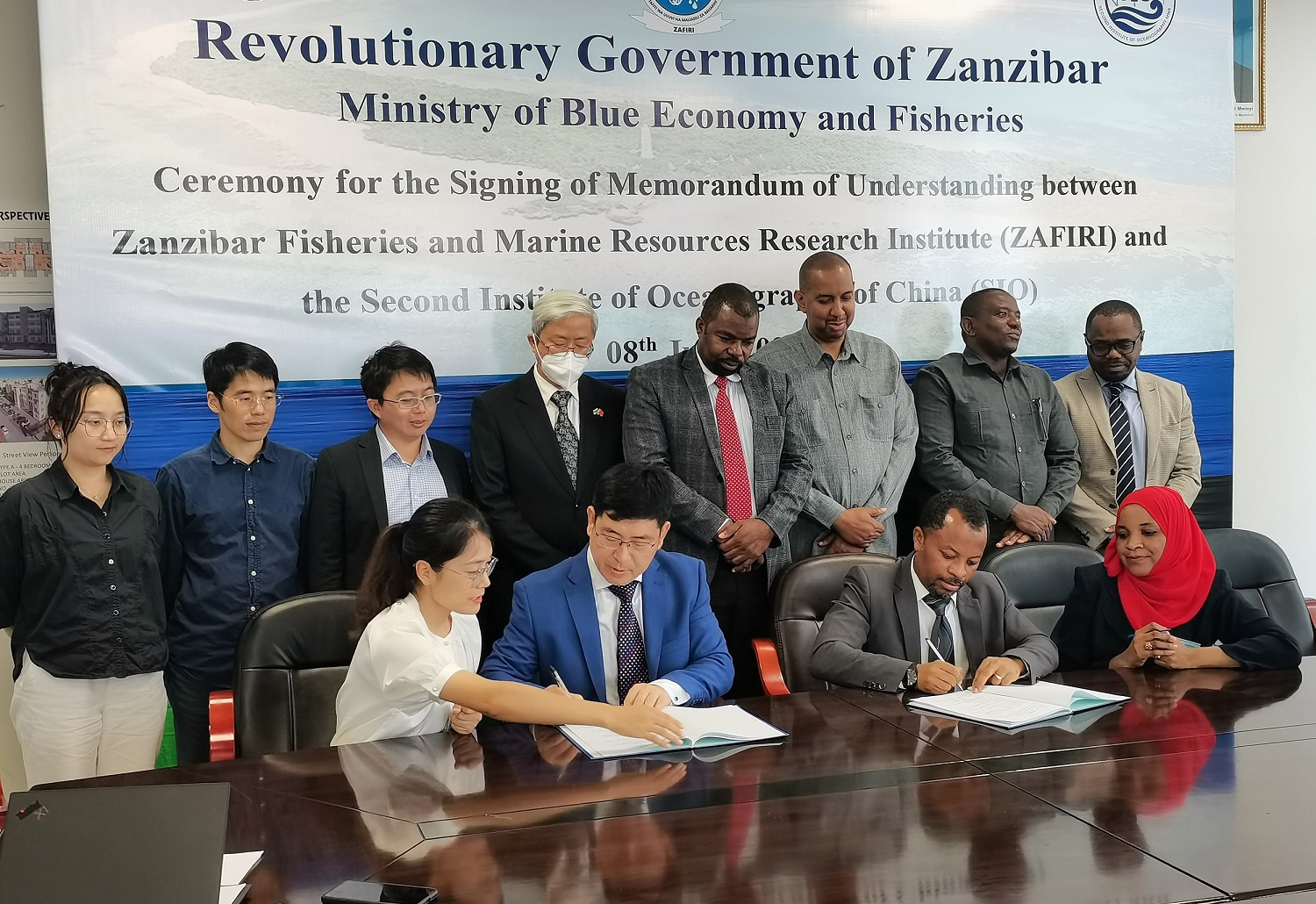 ZAFIRI and Second Institute of Oceanography delegates signing a marine-research cooperation memorandum at Zanzibar's Ministry of Blue Economy and Fisheries