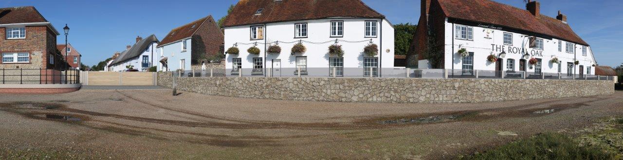Langstone waterfront at the Royal Oak showing an owner-published visual example of the proposed coastal defence treatment